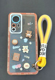 کاور شفاف Xiaomi Mi 12T Pro با عروسک خرس بیسکوییت برجسته و آویز زرد