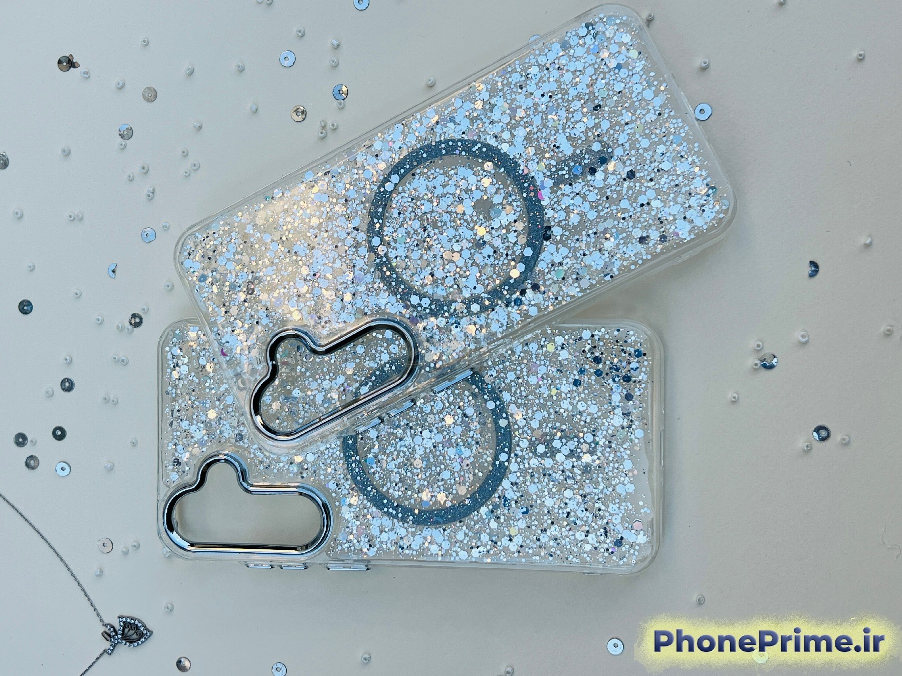 کاور اکلیلی شاین نقره‌ای مگ‌سیف با دور لنز کرومی مناسب Samsung A55 – قاب شفاف پولکی