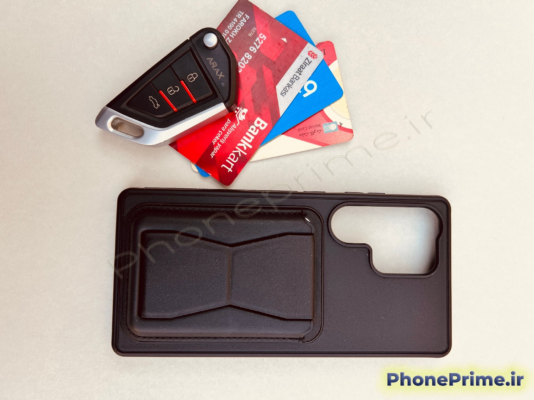 کاور چرمی مشکی ولت‌دار با جای کارت و قابلیت استند مخصوص سامسونگ Galaxy A25 – طراحی شیک و محافظ ضدضربه.