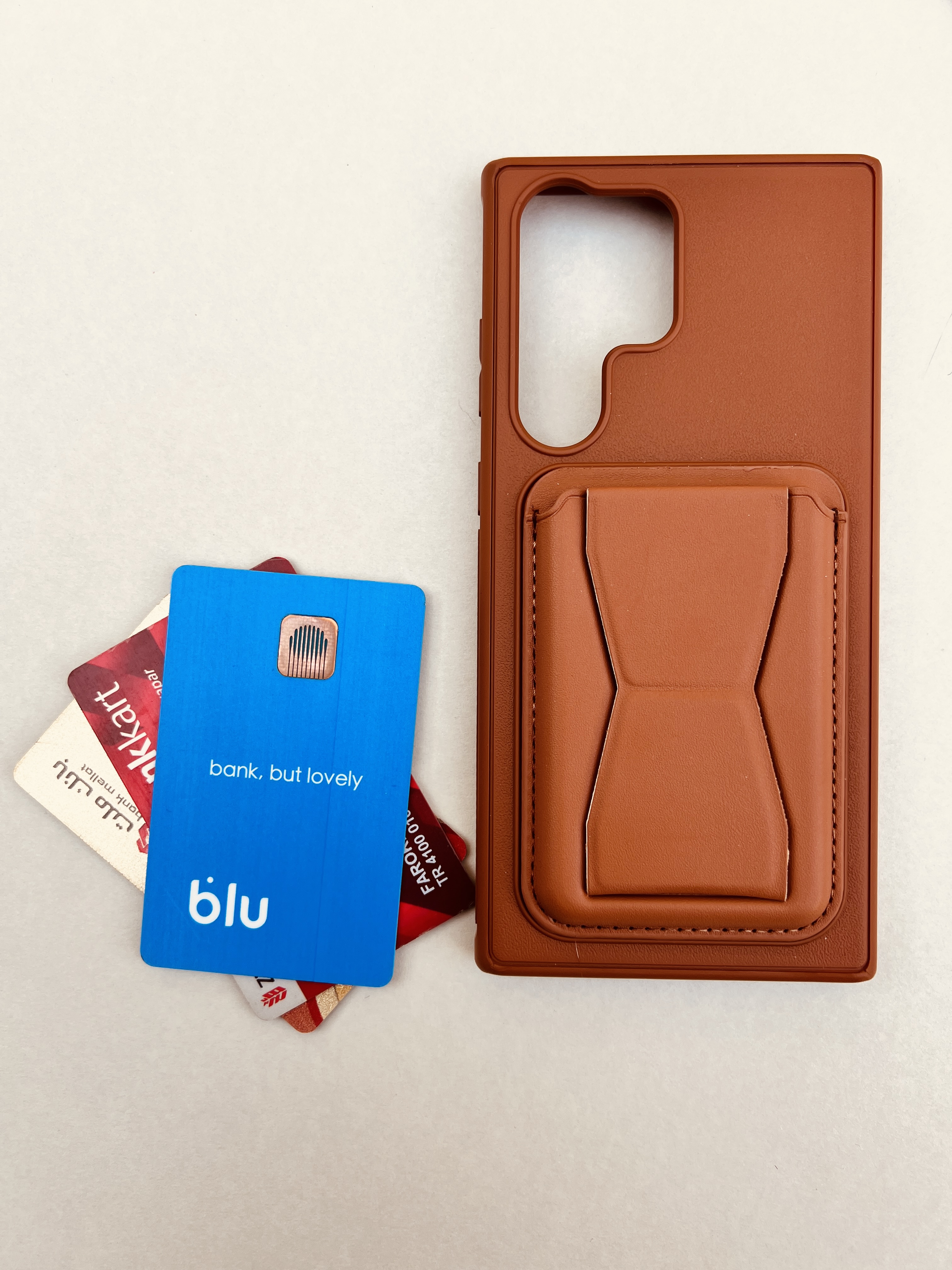 کاور چرمی قهوه ای جاکارتی دار گوشی سامسونگ A06