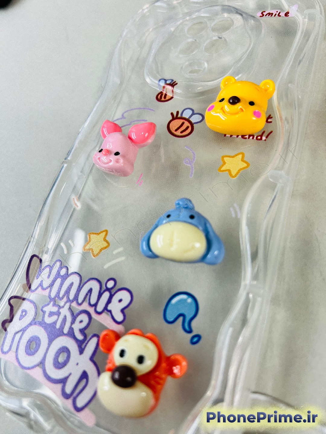 قاب گوشی سامسونگ A07 فانتزی طرح وینی پو عروسکی برجسته با بند آویز مهره ای و لبه موج دار