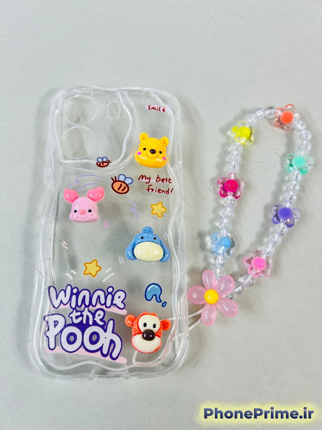 قاب گوشی سامسونگ A07 فانتزی طرح وینی پو عروسکی برجسته با بند آویز مهره ای و لبه موج دار