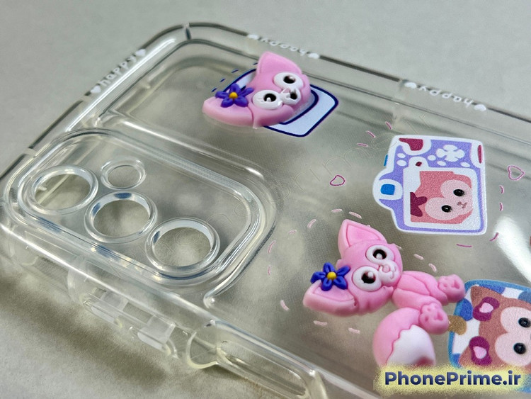 قاب شفاف سامسونگ A05s با عروسکهای برجسته صورتی و طرح دوربین عکاسی فانتزی و نوشته happy