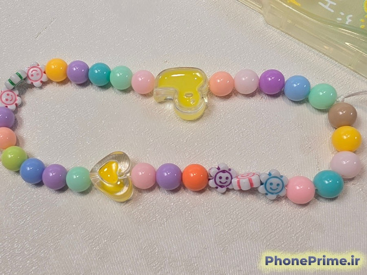 قاب فانتزی پافری گوشی سامسونگ A14 با طیف رنگی گرادینت پاستلی و آویز مهرهای رنگارنگ طرح خرگوش و اردک